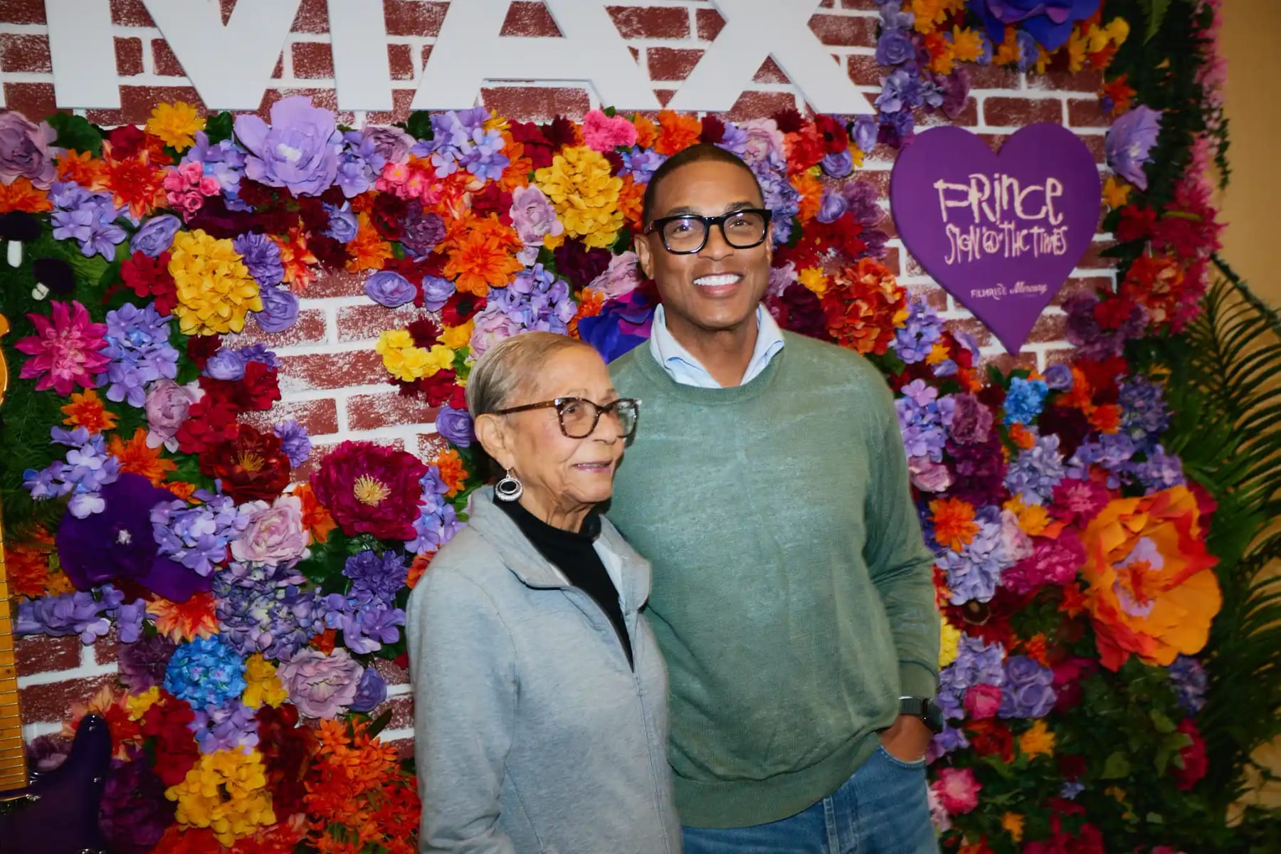 Guests at the IMAX Prince Sign o' the Times flower wall